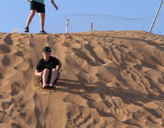 sandboarden met kinderen