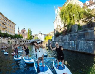 Supping op het water door Ljubljana