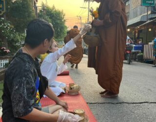 Morning alms Chiang Khan with monks