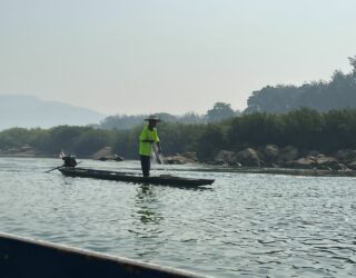 Visser op de Mekong rivier